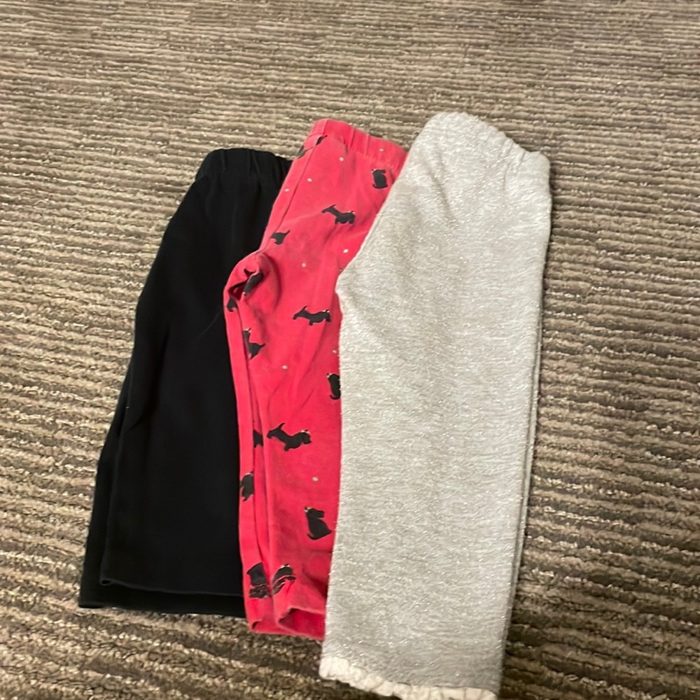 3 pair leggings - 1 black, 1 red w black poodles/silver polka dots, 1 silver